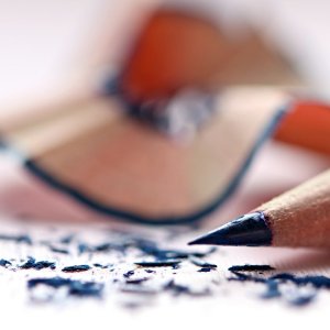 selective focus of blue colored pencil